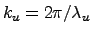 $k_u = 2\pi/\lambda_u$